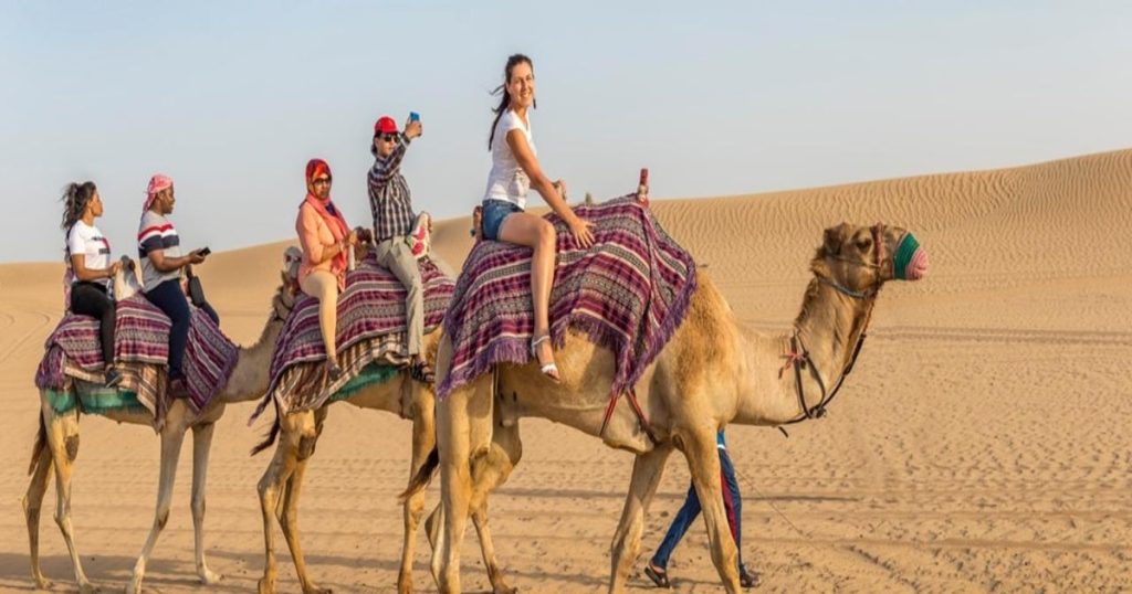 Tourists wearing comfortable clothes on a Dubai Desert Safari