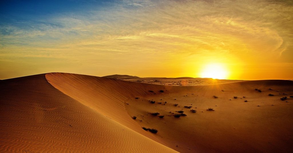 Ras Al Khaimah Desert Safari sunset over sand dunes