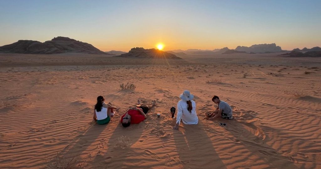 Al Ain Desert Safari sunset over golden dunes