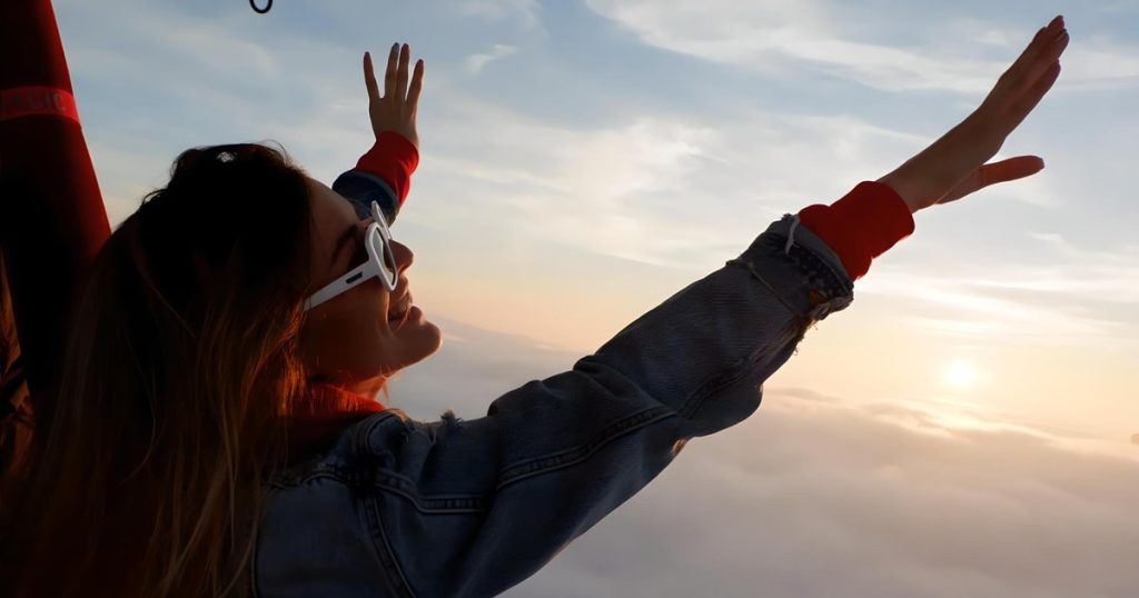 Dubai hot air balloon ride at sunrise over desert dunes