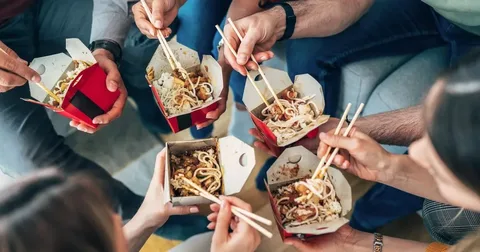 Family enjoying food during a Dubai city tour