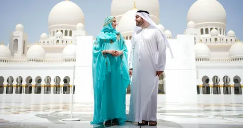 Muslim family visiting a mosque during a Dubai family city tour