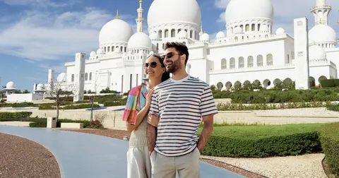 couples visiting Sheikh Zayed Grand Mosque Abu Dhabi